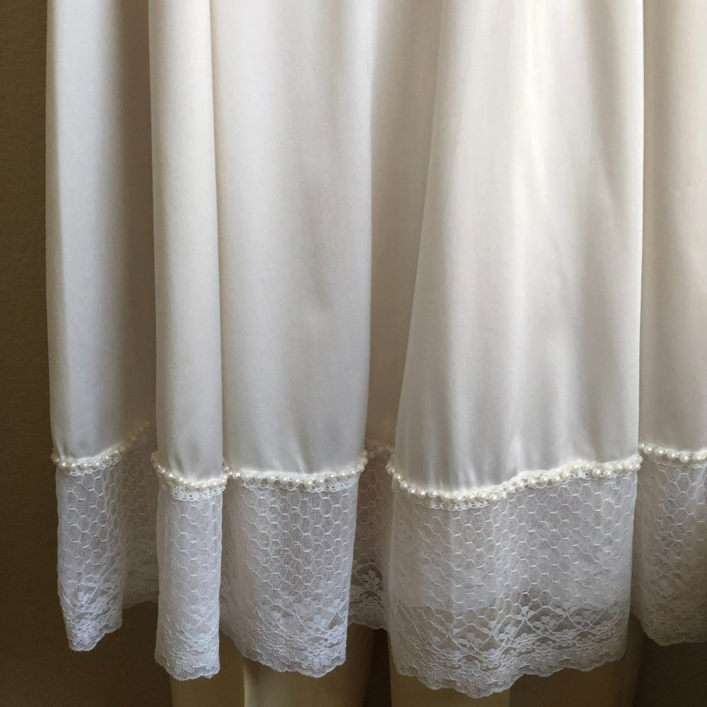 Bridal slip, midi, fitted front, full skirt, beaded bottom.